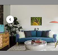 A2 landscape photo placed on a wall above the fire place