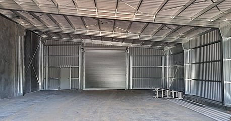 Steel shed with concrete