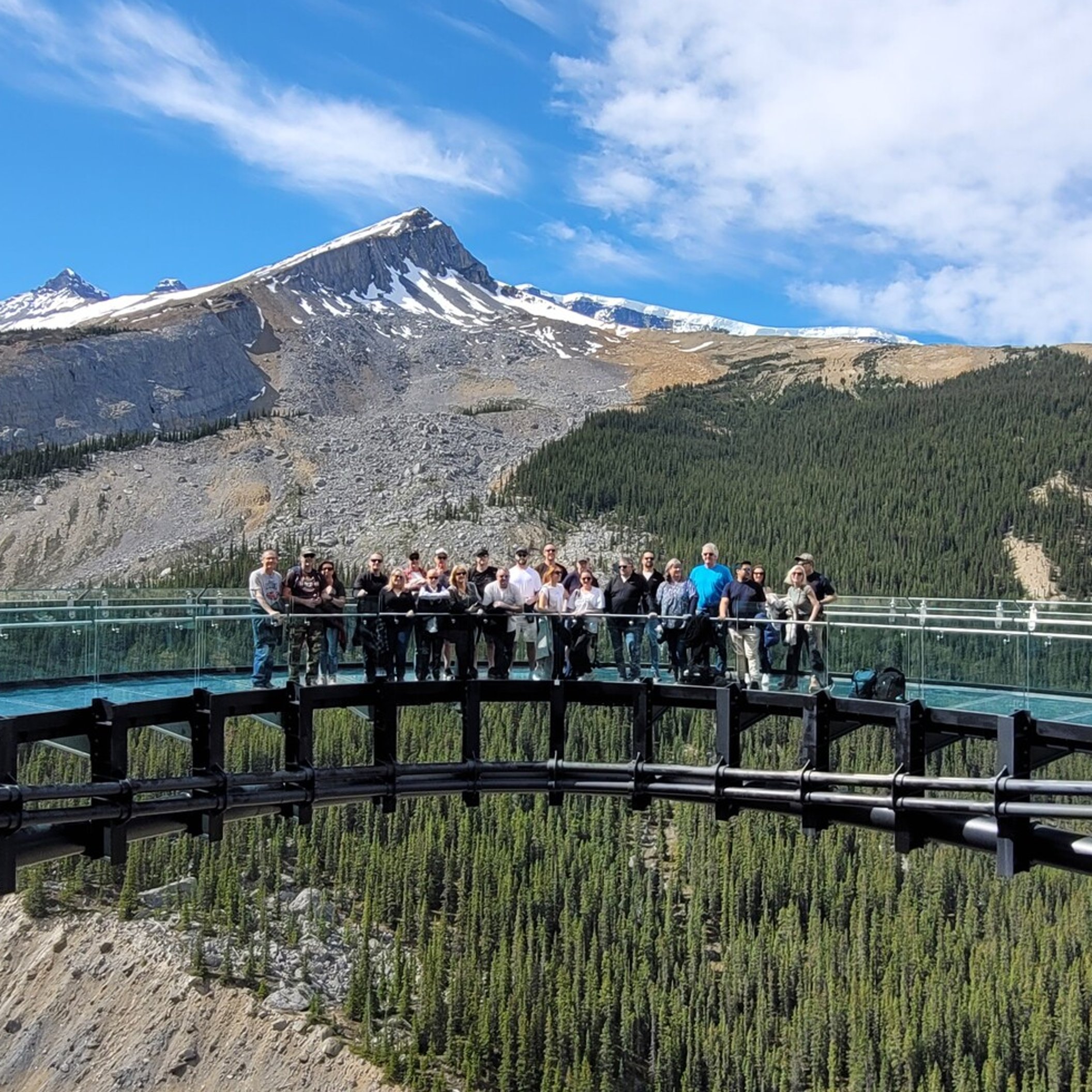 Incentive group standing on Glacier Skywalk in Canada