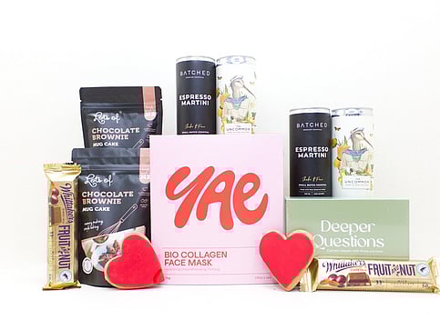 NZ selfcare gift box with facemasks, chocolate brownie, and a card game