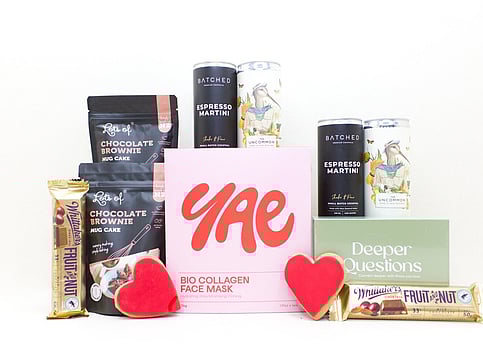 NZ selfcare gift box with facemasks, chocolate brownie, and a card game