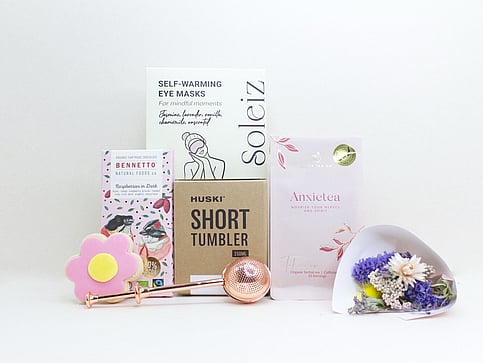 nz sympathy gifts with dried flowers, chocolate and eye masks