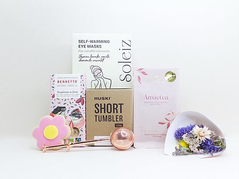 nz sympathy gifts with dried flowers, chocolate and eye masks