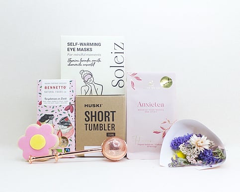 nz sympathy gifts with dried flowers, chocolate and eye masks