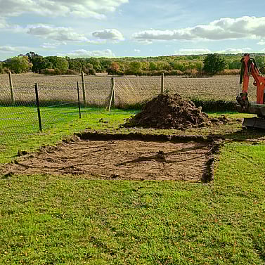Image shows excavated base area for the new castor ring. Approximately 180mm of soil removed.
