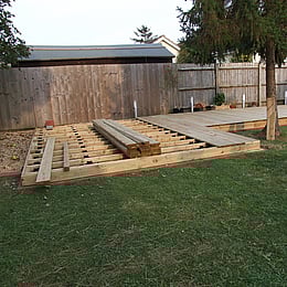 Still more decking boards to attach to the joist frame.