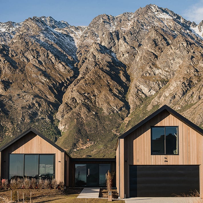 The house front bathed in the late evening sun.