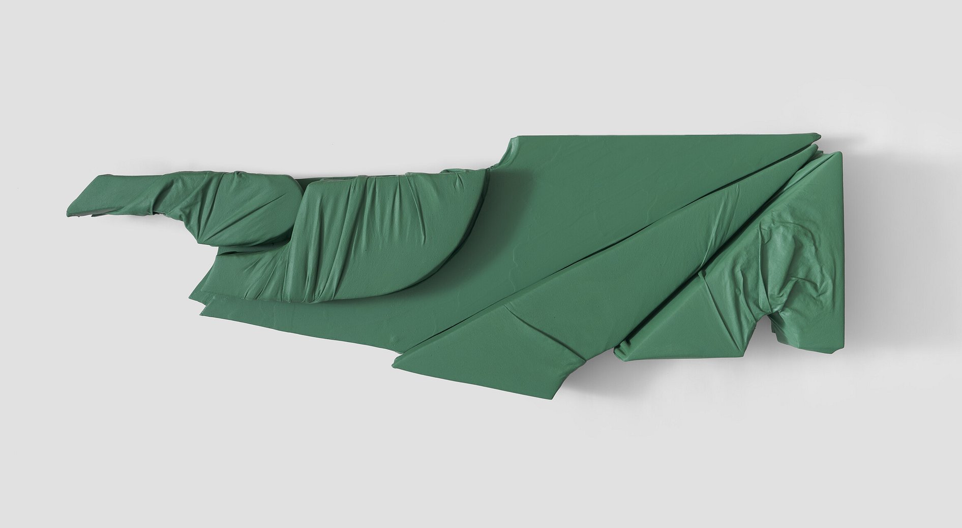 Green abstract wall sculpture large format shapes folds and curves, lines and levels