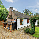 Walnut Cottage - log store