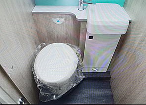 separate toliet, and sink with door