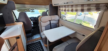 Front lounge, converts to a queen bed