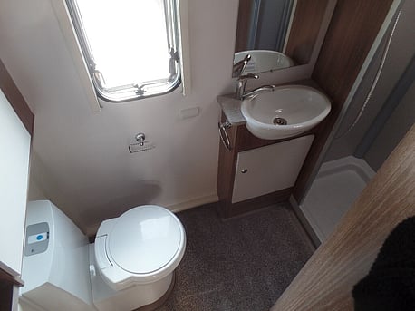 separate bathroom and shower,                        with glass door