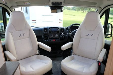 captain chairs, and front cab full air con