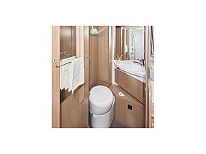 Large separate toilet, with sink and mirror
