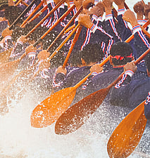 People Rowing with Oars