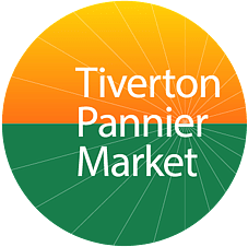 Image of a view from Redwoods Farm across the field with the sun setting over the hill in the distance