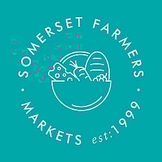 the babbling stream through our woodland with the light dancing on the water and grassland in the background