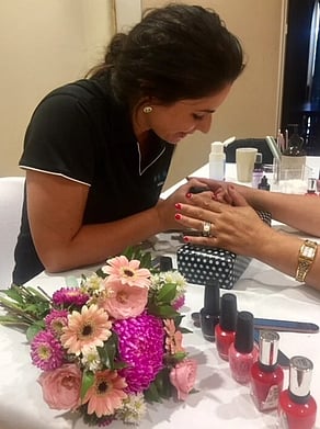 Manicurist giving a manicure