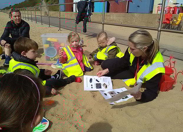 When we get down to the beach the children voice their own risk assesment. we discuss, Dogs, staying as a group, no climbing the rocks, no going to close to the water without an adult... We enjoy 20 minuites of free play with all the toys. after our play we are ready to explore our environment. The children have, magnify glasses, metal detectors, large tweezers (if they dont want to touch the seaweed) and scales to weigh their stones. the children choose what items they would like to explore from our treasure hunt sheet.
