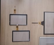 Surface capacitive touch screens