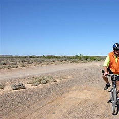 The cyclist on the Outback road