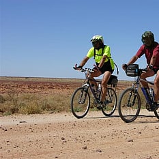 Two riders on Outback road