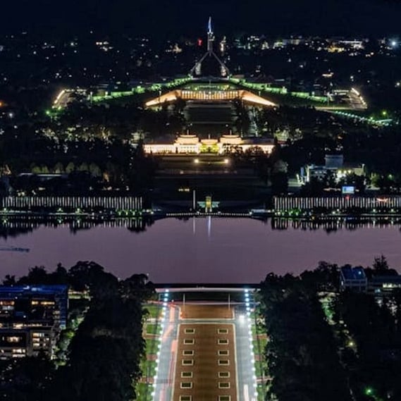 Aerial shot of Canberra's Parliament House at night