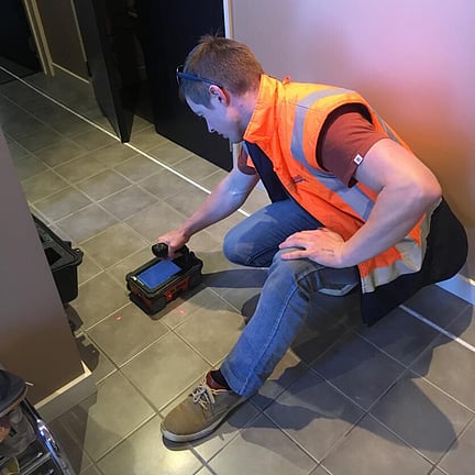 Scientist scanning concrete