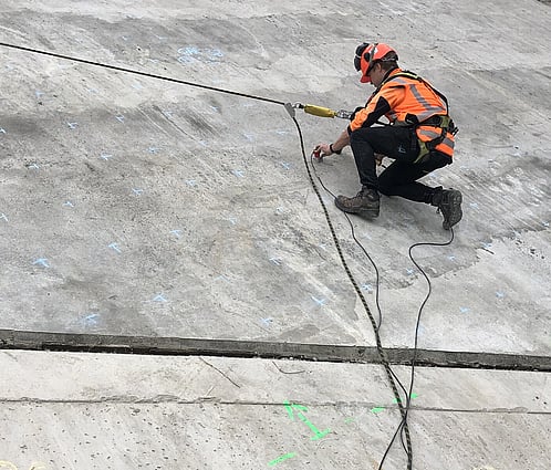 metal poles fixed in concrete