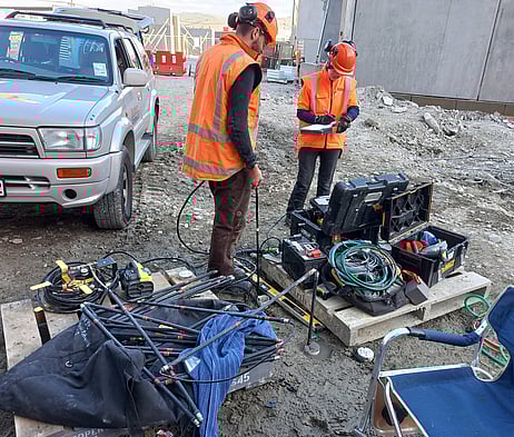 four scientist using Crosshole Testing equipment