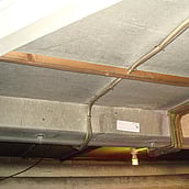 Asbestos cement sheets to a ceiling