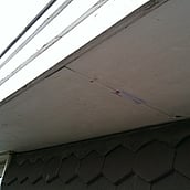 Asbestos cement soffit boards