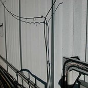 Asbestos coating to metal corrugated sheets (galbestos)