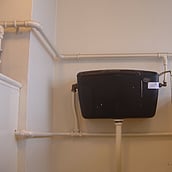 Asbestos containing toilet cistern