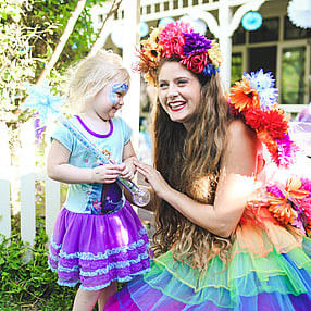 Rainbow Flower Fairy with Child with face painted