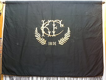 The historic banner of the 1891 Kūaotunu Football Club
