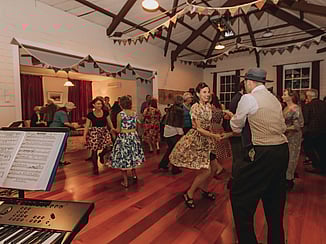 Kūaotunu locals enjoying a 1940's dance party at the Kūaotunu Hall