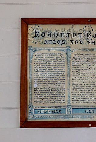 A framed picture of the rules and regulations of the Kūaotunu Rifle Club (circa 1912)