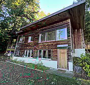 The new beach house was placed to avoid the native vegetation and rock features shown.