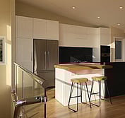 Custom kitchen design featuring two-pac painted panels, honed black and polished Blue Pearl granite, and Tassie Oak butcher block to match the flooring.