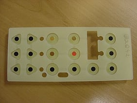 Silicone keypad with gold plated pills