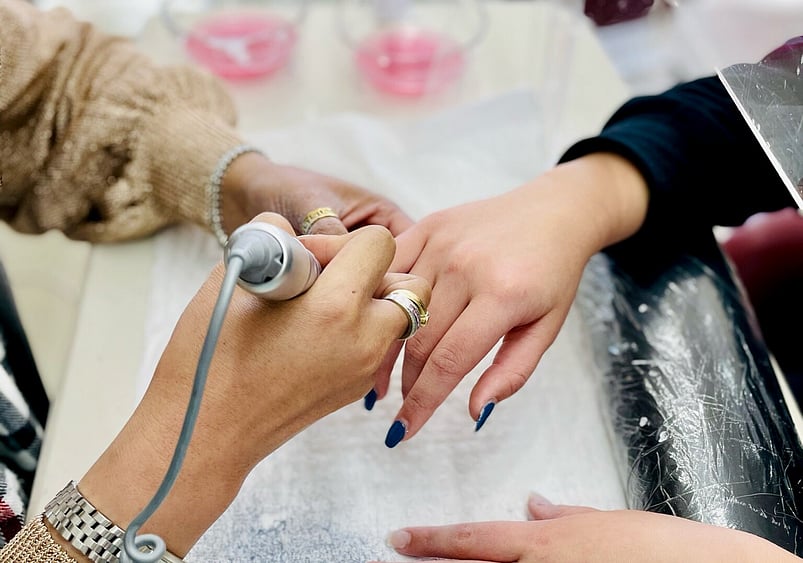 Image of nail removal by nail technician at Princess Nails Spa and Beauty