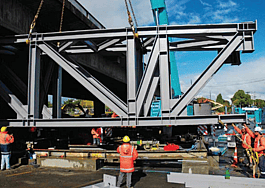PTG stressbar being crane lifted into place