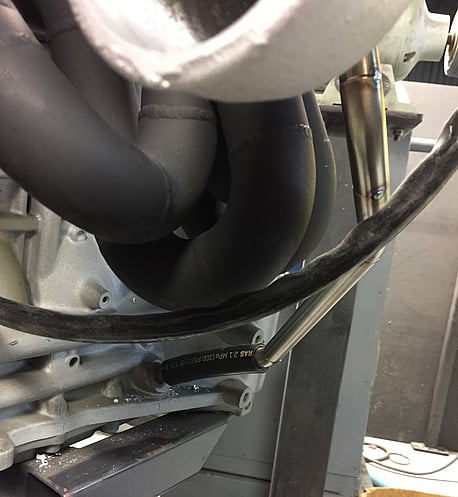 This picture shows the solid line runs the whole length of the drain and is connected the block with a rubber section of hose