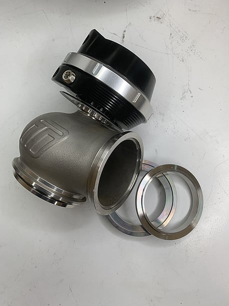 The outlet Vband flange has a recess to locate it when clamped up to the waste-gate, it also is machined to accept a tube for the pipe to vent to atmosphere or to be run back into the exhaust