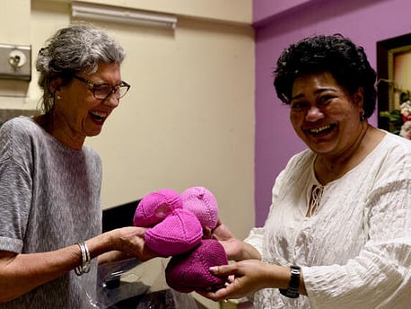 Pauline hands over "knitted knockers" to Oncology Ward, Suva Hospital