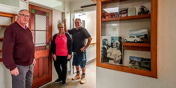 Don Harris (Chair of the Friends of Resthaven Foundation), Tracy Fairhall (Registered Diversional Therapist at Resthaven on Burns) and Jake Young (Resthaven Maintenance) beside the newly installed doors that are making a difference for residents living with dementia at Resthaven on Burns Care Centre.