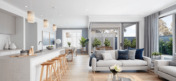 A modern open plan kitchen with caesarstone benchtop