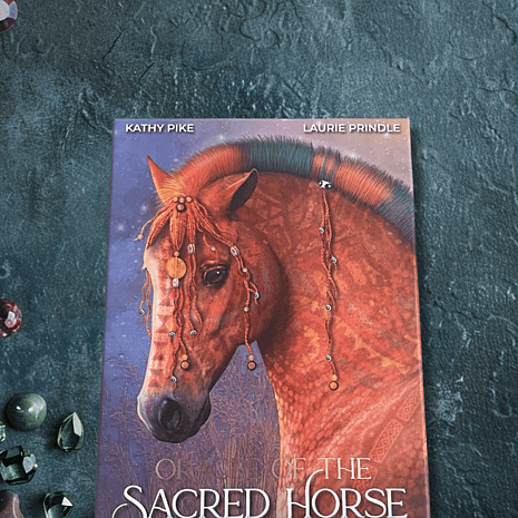Oracle of the Sacred Horse by Kathy Pike on a moss and gem background