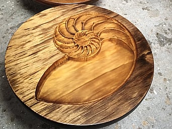 carved kauri small table